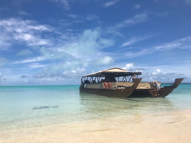 Boat in a clear blue lagoon
