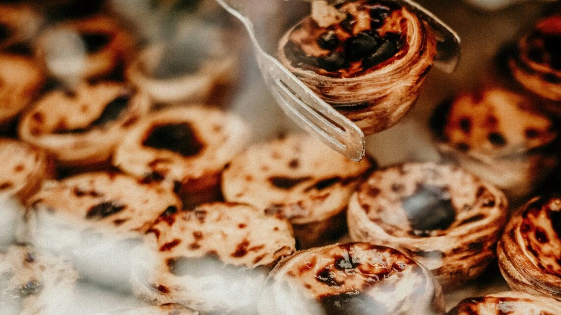 brown and white egg custards in a store window
